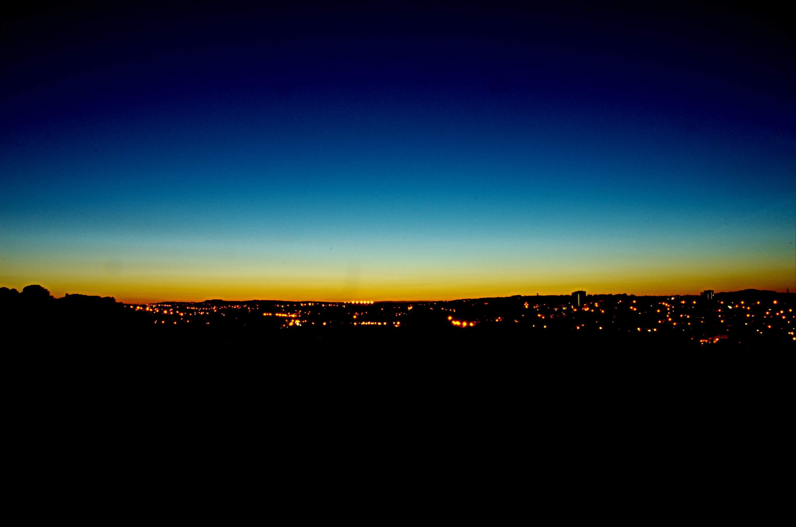 photo of a summer solstice sunset over Leeds